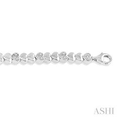 1/6 Ctw Puffed Heart Plain and Round Cut Diamond Fashion Bracelet in Sterling Silver