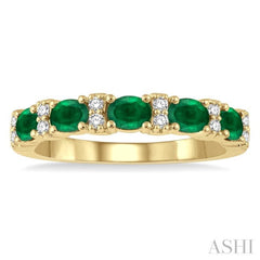 1/6 Ctw Oval Shape 4x3 MM Emerald and Round Cut Diamond Precious Band in 14K Yellow Gold