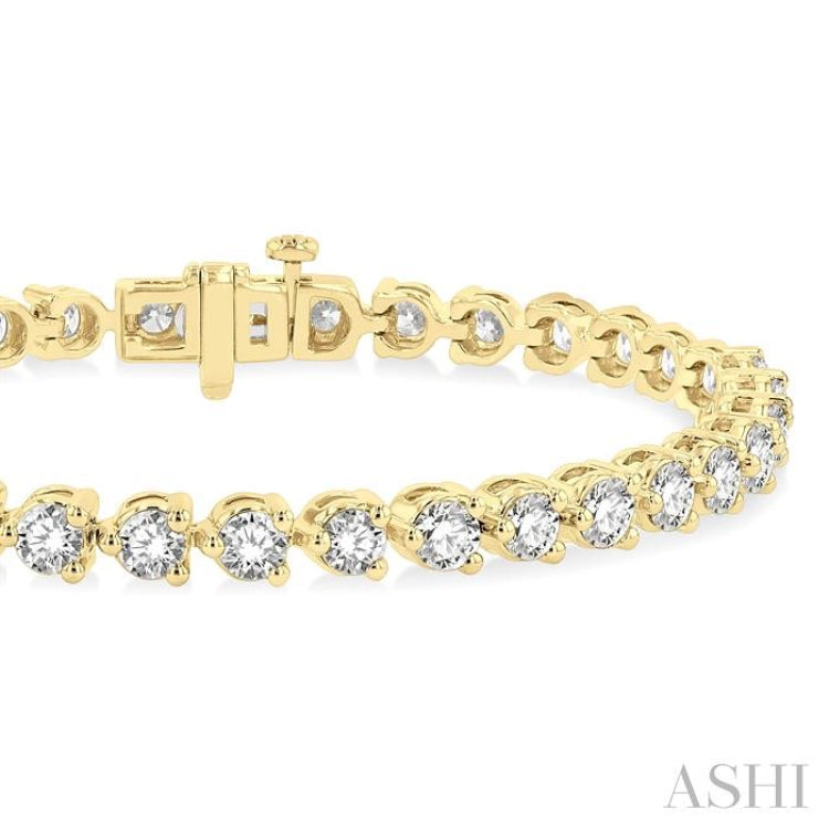 7 Ctw Tri-Prong Round Cut Diamond Tennis Bracelet in 14K Yellow Gold