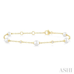 1/6 Ctw 5 MM Cultured Pearl and Round Cut Diamond Fashion Station Bracelet in 14K Yellow Gold