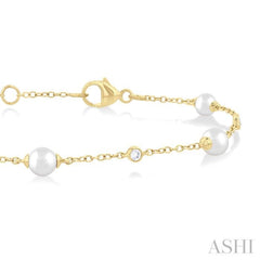 1/20 Ctw 4 MM Cultured Pearl and Round Cut Diamond Fashion Station Bracelet in 14K Yellow Gold