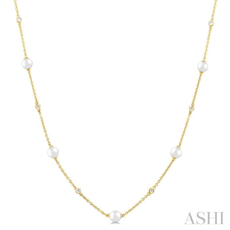 1/6 Ctw 4 MM Cultured Pearl and Round Cut Diamond Station Necklace in 14K Yellow Gold