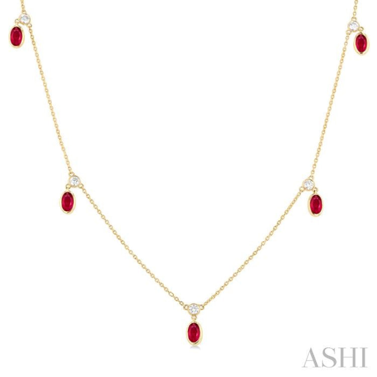 1/8 ctw Round Cut Diamonds and 5X3MM Oval Shape Ruby Precious Station Necklace in 10K Yellow Gold