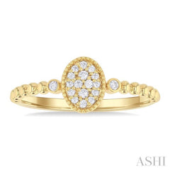 1/8 Ctw Petite Bead Shank Oval Center Round Cut Diamond Fashion Ring in 10K Yellow Gold