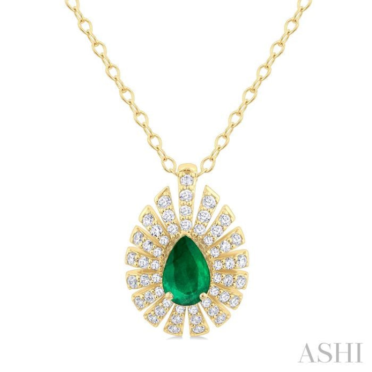 1/3 Ctw Starburst 6X4MM Pear Cut Emerald and Round Cut Diamond Precious Pendant With Chain in 14K Yellow Gold