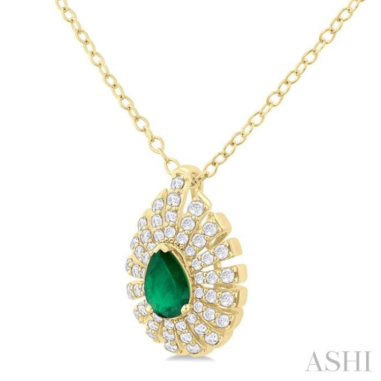 1/3 Ctw Starburst 6X4MM Pear Cut Emerald and Round Cut Diamond Precious Pendant With Chain in 14K Yellow Gold