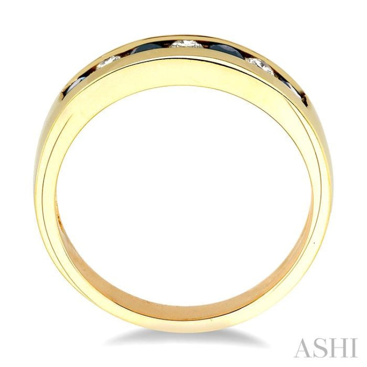 1/5 Ctw Channel Set Round Cut Diamond and 2.5 MM Round Cut Sapphire Band in 14K Yellow Gold