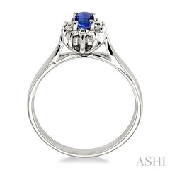 5x3mm Oval Cut Tanzanite and 1/10 Ctw Round Cut Diamond Ring in 10K White Gold