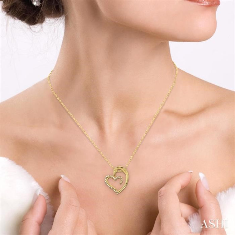 1/10 Ctw Round Cut Diamond Heart Shape Pendant in 14K Yellow Gold with Chain