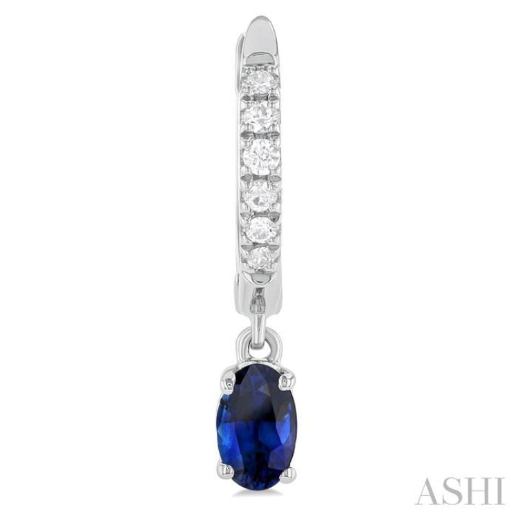 1/8 ctw Petite 5x3 MM Oval Cut Sapphire and Round Cut Diamond Precious Fashion Huggies in 10K White Gold