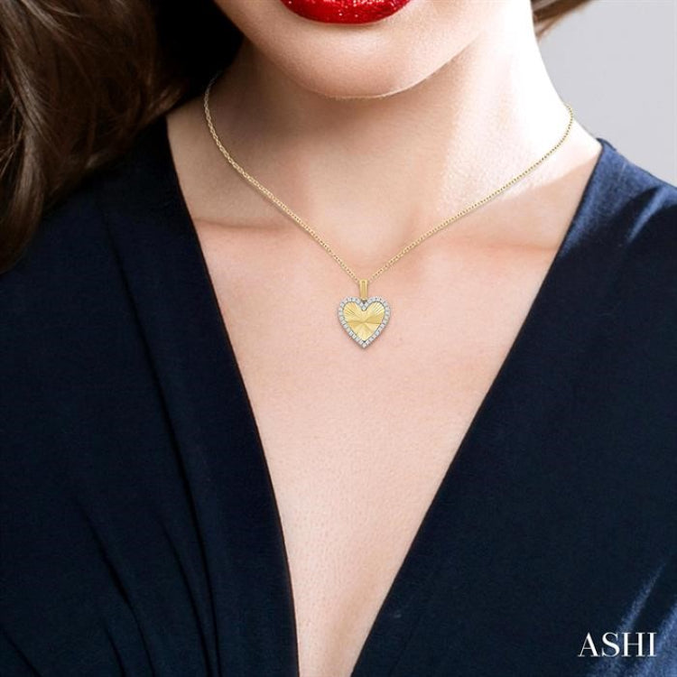 1/4 Ctw Fluted Texture Heart Round Cut Diamond Fashion Pendant With Chain in 10K Yellow and White Gold