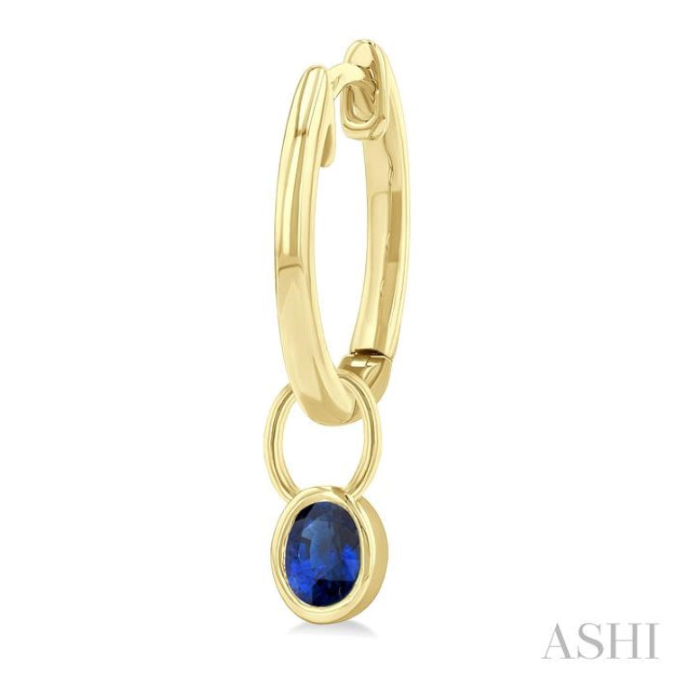 5x3 MM Bezel Set Oval Cut Sapphire Precious Fashion Huggie Earrings in 10K Yellow Gold