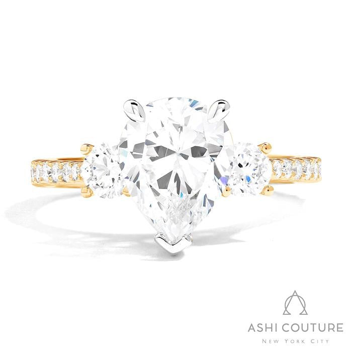 Bridal 3-Stone Diamond Pear Semi-Mount Engagement Ring With Round Side Diamonds in Yellow and White Gold