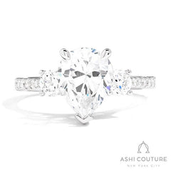 Bridal 3-Stone Diamond Pear Semi-Mount Engagement Ring With Round Side Diamonds in White Gold