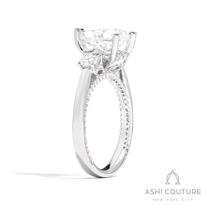 Bridal 3-Stone Pear Semi-Mount Engagement Ring With Round Side Diamonds in White Gold